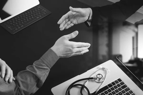 Medical and healthcare concept,Doctor and patient shaking hands