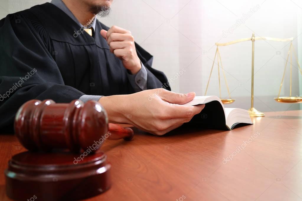 justice and law concept.Male judge in a courtroom with the gavel