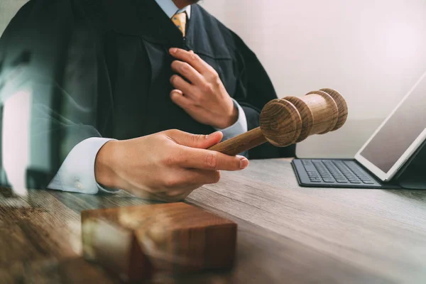 justice and law concept.Male judge in a courtroom with the gavel