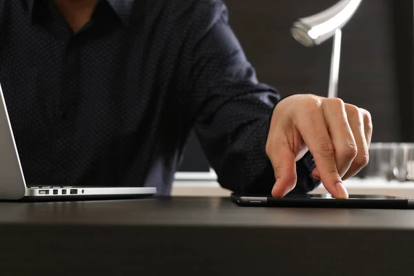 Businessman using digital tablet and laptop computer and documen — Stock Photo, Image