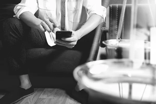 Justice and Law context.Male lawyer hand sitting on sofa and wor