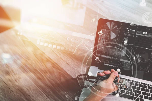 Smart medical doctor working with laptop computer and stethoscop — Stock Photo, Image