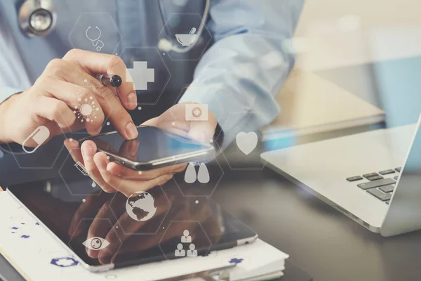 Smart medical doctor working with smart phone and stethoscope an — Stock Photo, Image