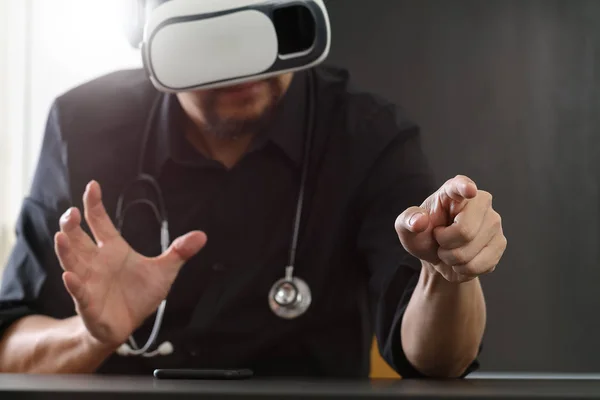 Businessman wearing virtual reality goggles in modern office wit — Stock Photo, Image