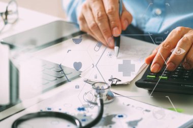 Sağlık masrafları ve ücretleri kavramı. Bir ca akıllı doktor el kullanılan