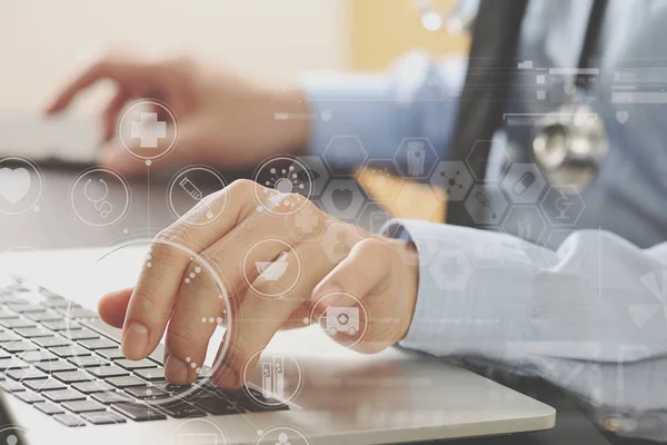 Close up of smart medical doctor working with laptop computer an — Stock Photo, Image