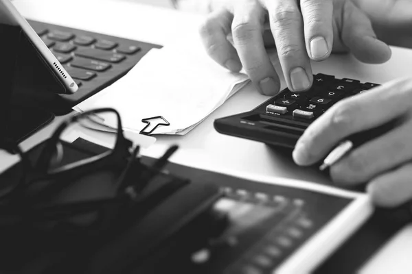 Close up of businessman hand working with finances about cost an — Stock Photo, Image