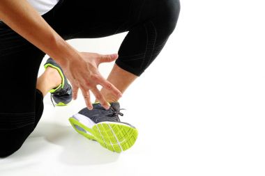 Ayak bileği ağrısı bükülmüş kırık ile ortak holding runner sporcu