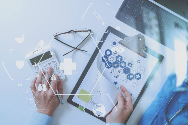 top view of Healthcare costs and fees concept.Hand of smart doct