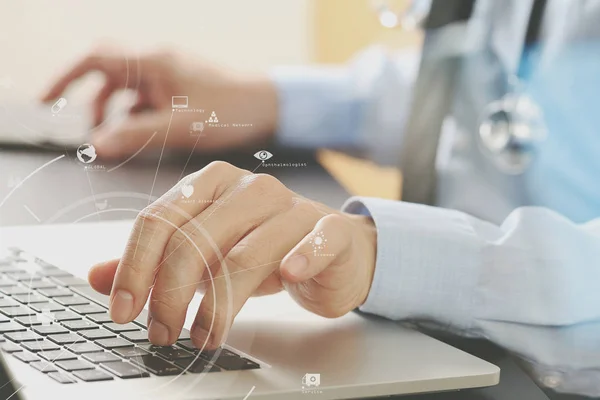 Close up of smart medical doctor working with laptop computer an — Stock Photo, Image