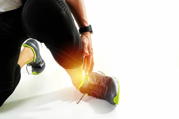 Runner sportsman holding ankle in pain with Broken twisted joint — Stock Image Runner sportsman holding ankle in pain with Broken twisted joint Stock Image