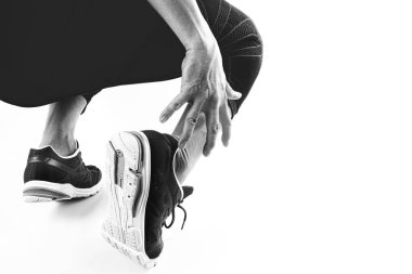 Ayak bileği ağrısı bükülmüş kırık ile ortak holding runner sporcu