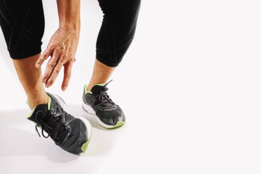 Ayak bileği ağrısı bükülmüş kırık ile ortak holding runner sporcu