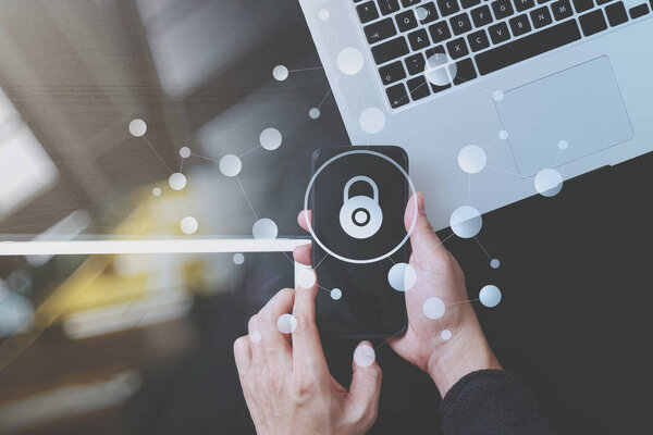 cyber security internet and networking concept.Businessman hand 