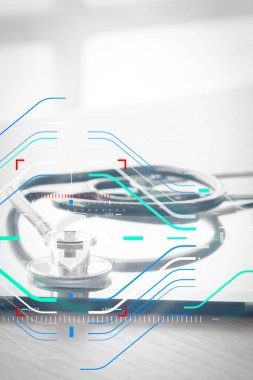 Studio makrosu bir stetoskop ve ahşap masa b dijital tablet