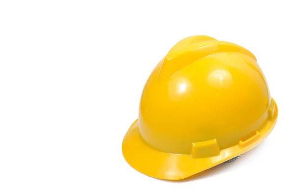 Жовтий шолом інженера з безпеки на білому тлі, відсічний патерн — стокове фото