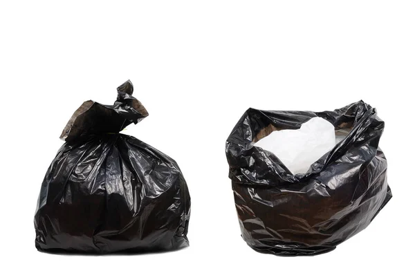 Двойные черные полиэтиленовые пакеты для мусора на белом фоне, вырезка — стоковое фото