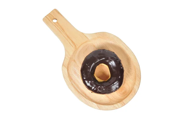 Single donut lay on wooden chopping block — Stock Photo, Image