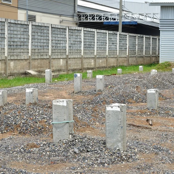 Construction area with concrete piles, building base — Stock Photo, Image