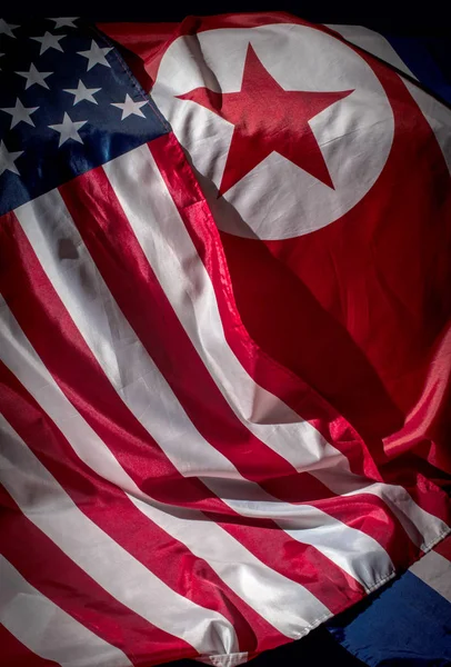 Flags of North Korea and USA