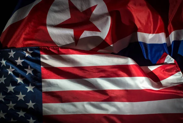 Flags of North Korea and USA