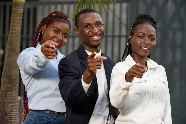 A group of business people giving a hand sign — Stock Photo, Image
