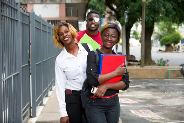 Group of happy students in the street — Stock Photo, Image