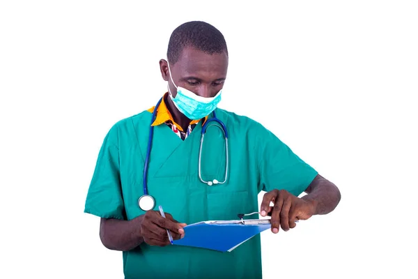 Handsome Young Male Doctor Wearing Medical Mask Writing Notes Clipboard — Stock Photo, Image