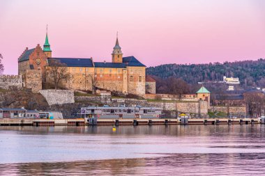 Sunset view of the Akershus fort in Oslo, Norway clipart