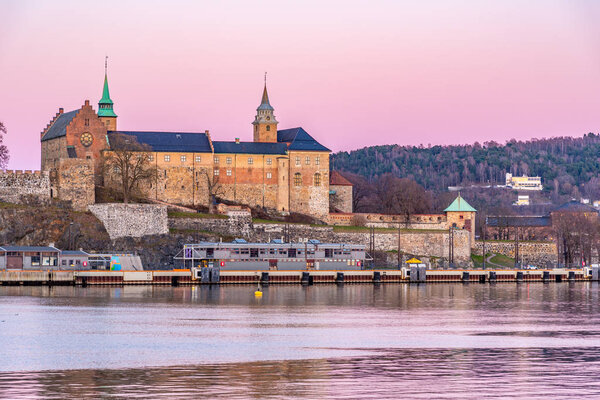 Sunset view of the Akershus fort in Oslo, Norway