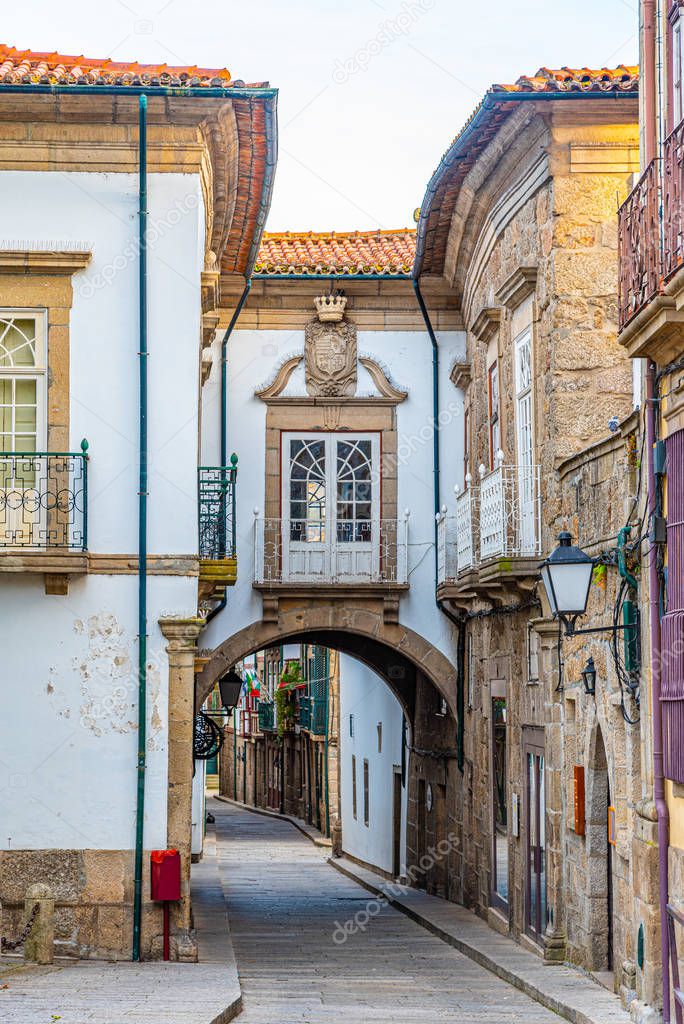 View of a narrow street in the old town of Guimaraes, Portugal