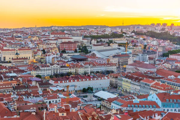 Sunset view of Praca da Figueira square in Lisbon, Portugal — стокове фото