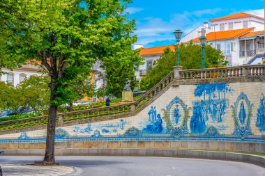 VISEU, PORTUGAL, MAY 20, 2019: Azulejo mosaics at praca republic clipart