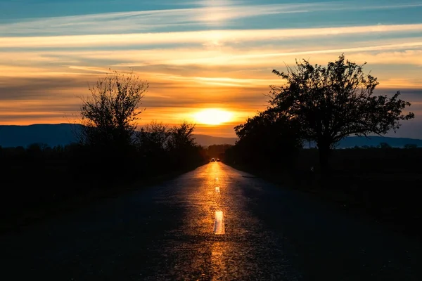 Sonnenuntergang auf dem Weg — Stockfoto