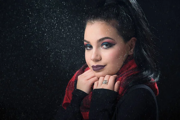 Beautiful girl  with a red hall — Stock Photo, Image