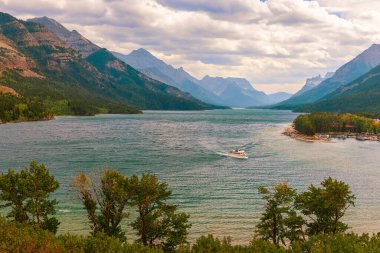 View of Upper Waterton Lake just before the thunderstorm at Waterton Lakes National Park. Alberta. Canada clipart