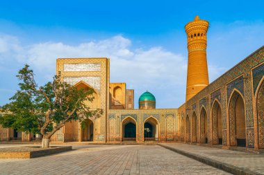 Inner courtyard at Islamic religious complex Po-i-Kalyan located around the Kalan minaret with the madrasa. Bukhara. Uzbekistan clipart