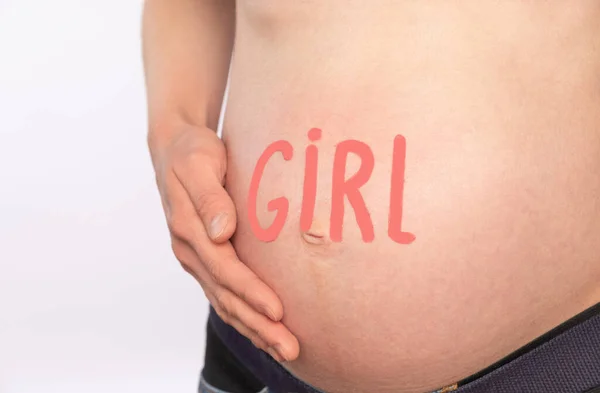 Bauch Einer Schwangeren Frau Mit Den Worten Mädchen Weißer Hintergrund — Stockfoto