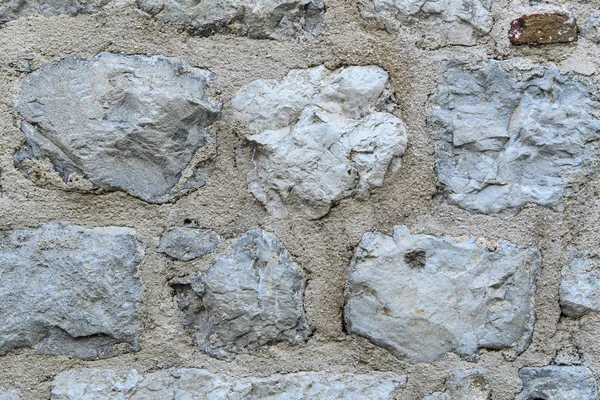 Ein Fragment Einer Alten Steinmauer Aus Groben Steinen Hintergrund Grau — Stockfoto