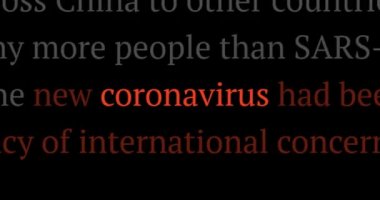 Coronavirus dünya medyasında manşetlerde, siyah arka planda ters köşe. Yakınlaştırmalı video.