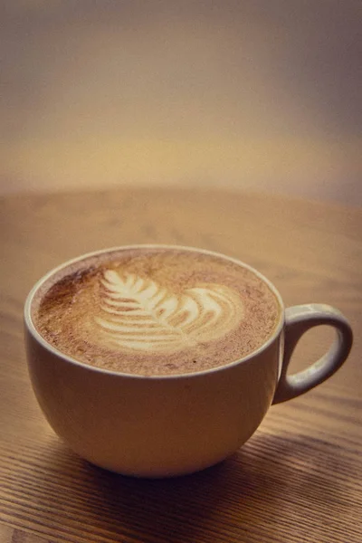 A cup of coffee in warm summer evening/