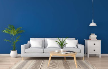 Klasik mavi oturma odasındaki gri kanepe.