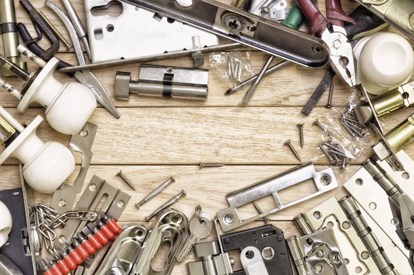 Tools and mortise lock arranged in a frame. — Stock Photo, Image