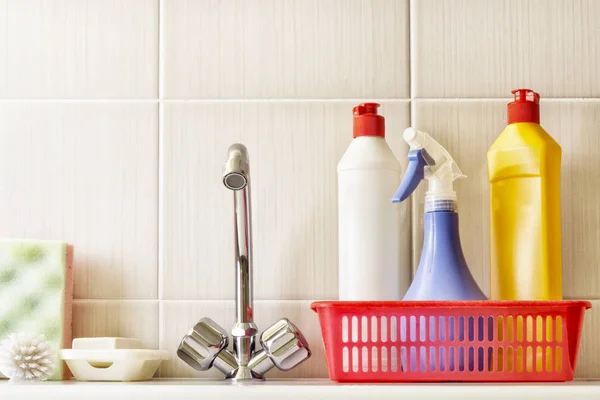 Water taps, brush and detergent. — Stock Photo, Image