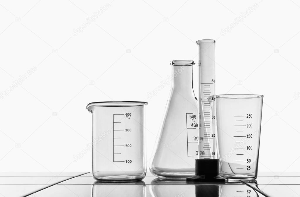 Laboratory glassware and ceramic countertop.