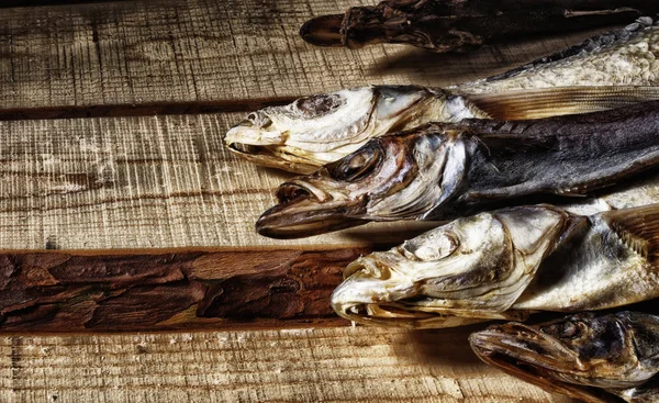 The dried fish lies on the boards — Stock Photo, Image