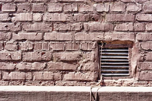 Old peeling brick wall textured — Stock Photo, Image