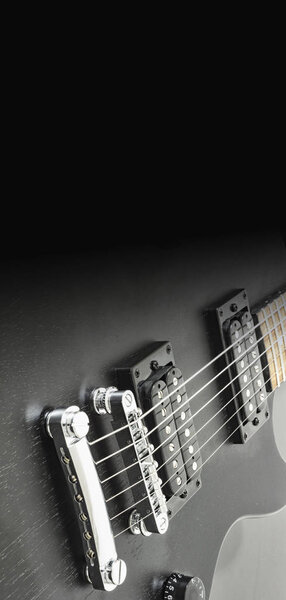 Poster, black electric guitar, close-up