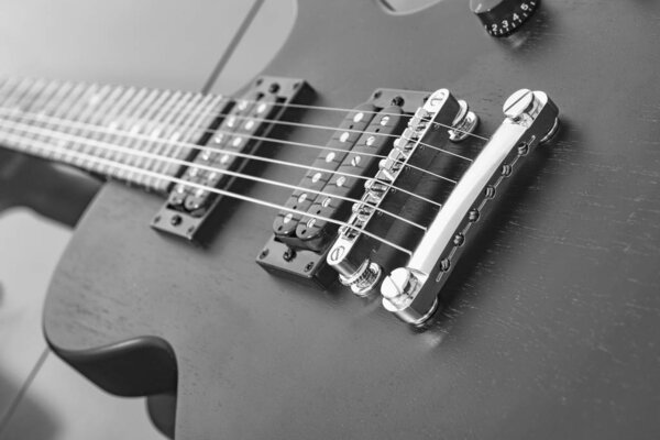 Electric guitar, silver strings, black case