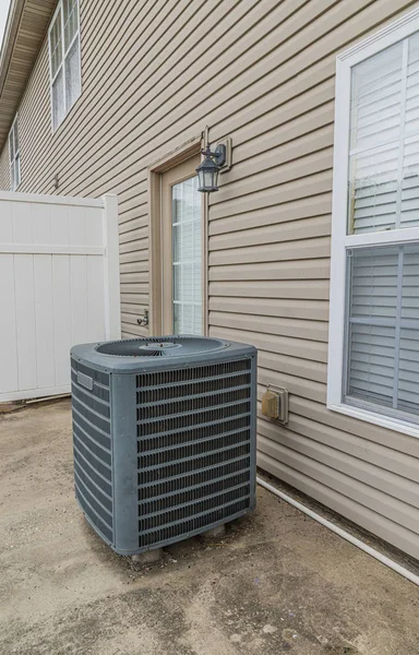 Air Conditioning Unit on Patio Behind Condo — Stock Photo, Image